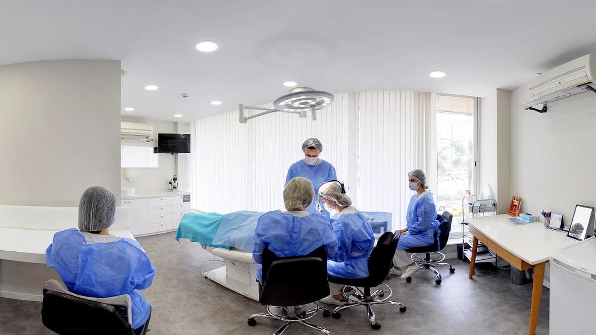 The DK Hair Klinik procedure room, with the medical team at work