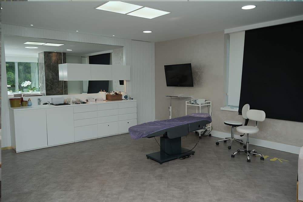 A treatment room at the clinic with an examination bed